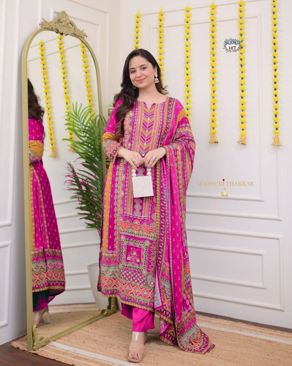 Stylish Pink Printed Muslin Suit Set with Chevron Embroidered Yoke