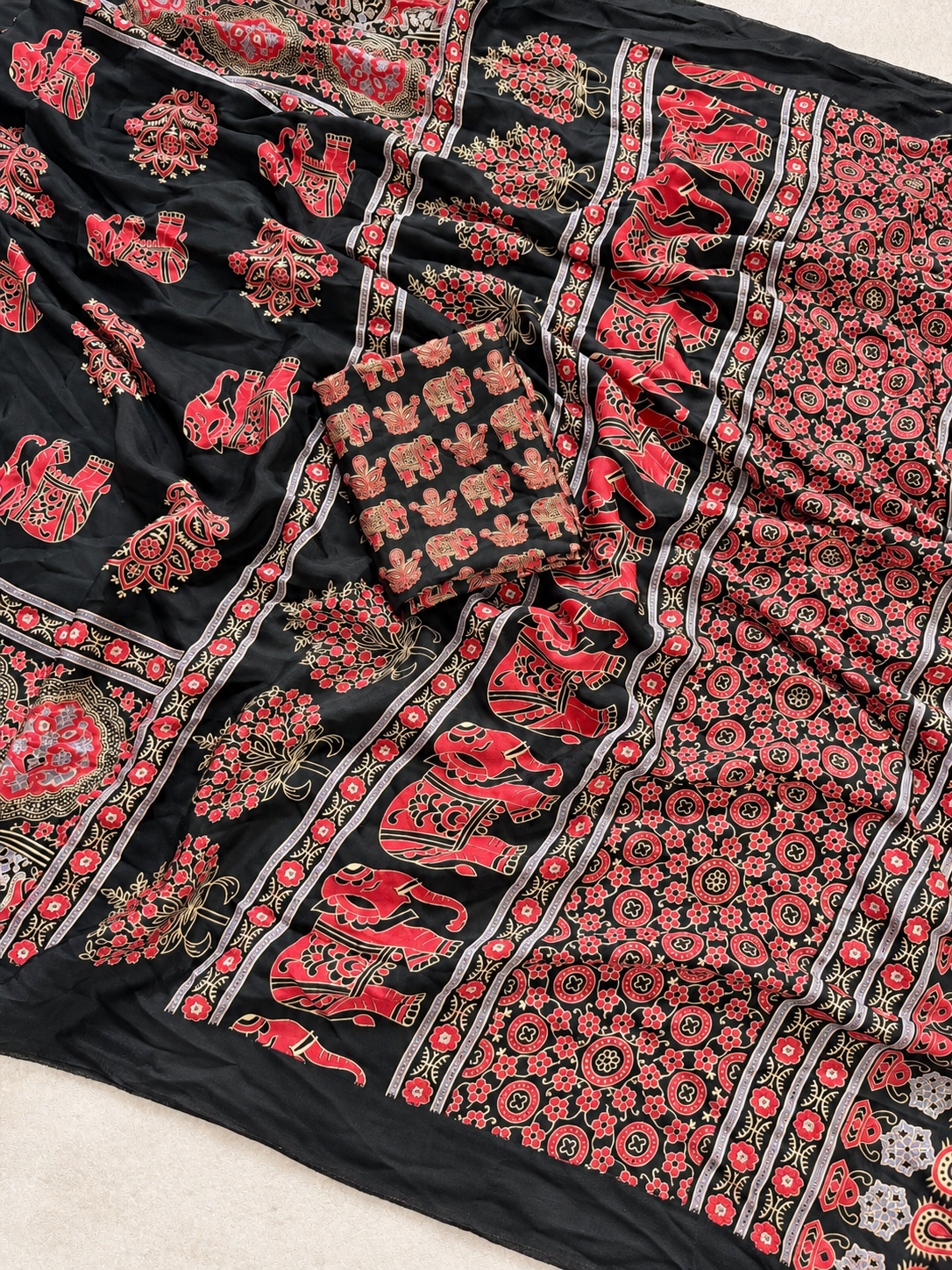 Adorning Black Gajji Silk Saree with Traditional Ajrakh Print