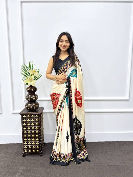 Designer Cream Japan Satin Silk Print Saree with Heavy Mirror Embellished Border and Viscose Latkan Pallu