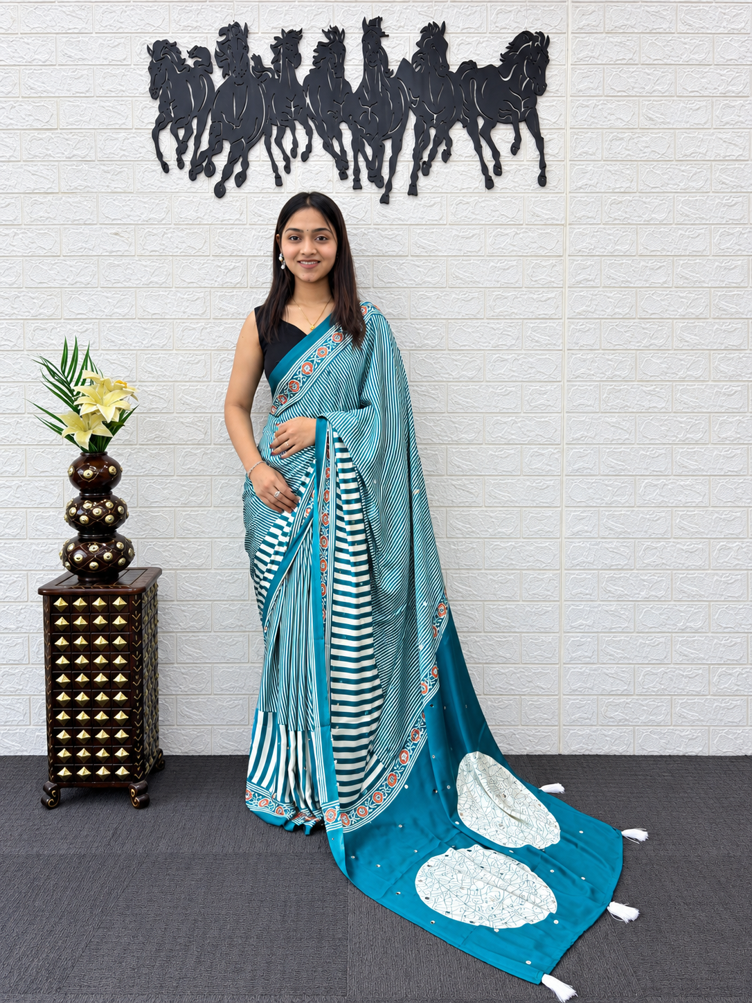 The Shanaya Peacock Illusion Luxury Teal Blue Striped Satin Silk Saree
