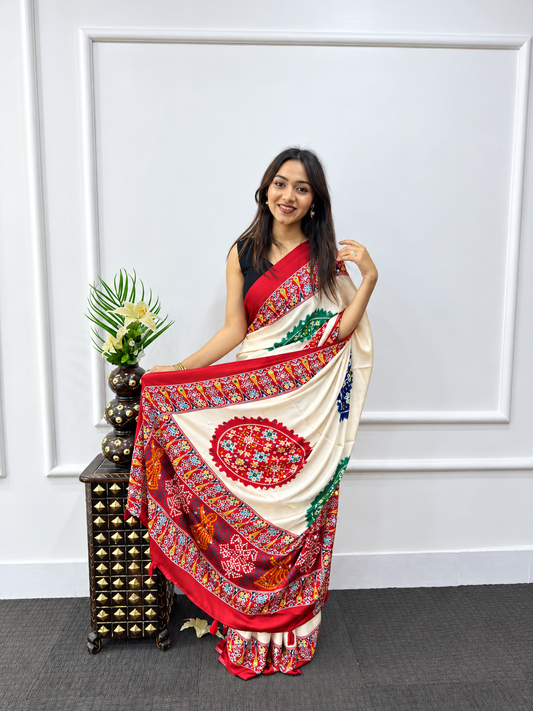 Elegant Cream Japan Satin Silk Saree with Multicolored Patola Mandala Prints and Heavy Handcrafted Mirror Work Border
