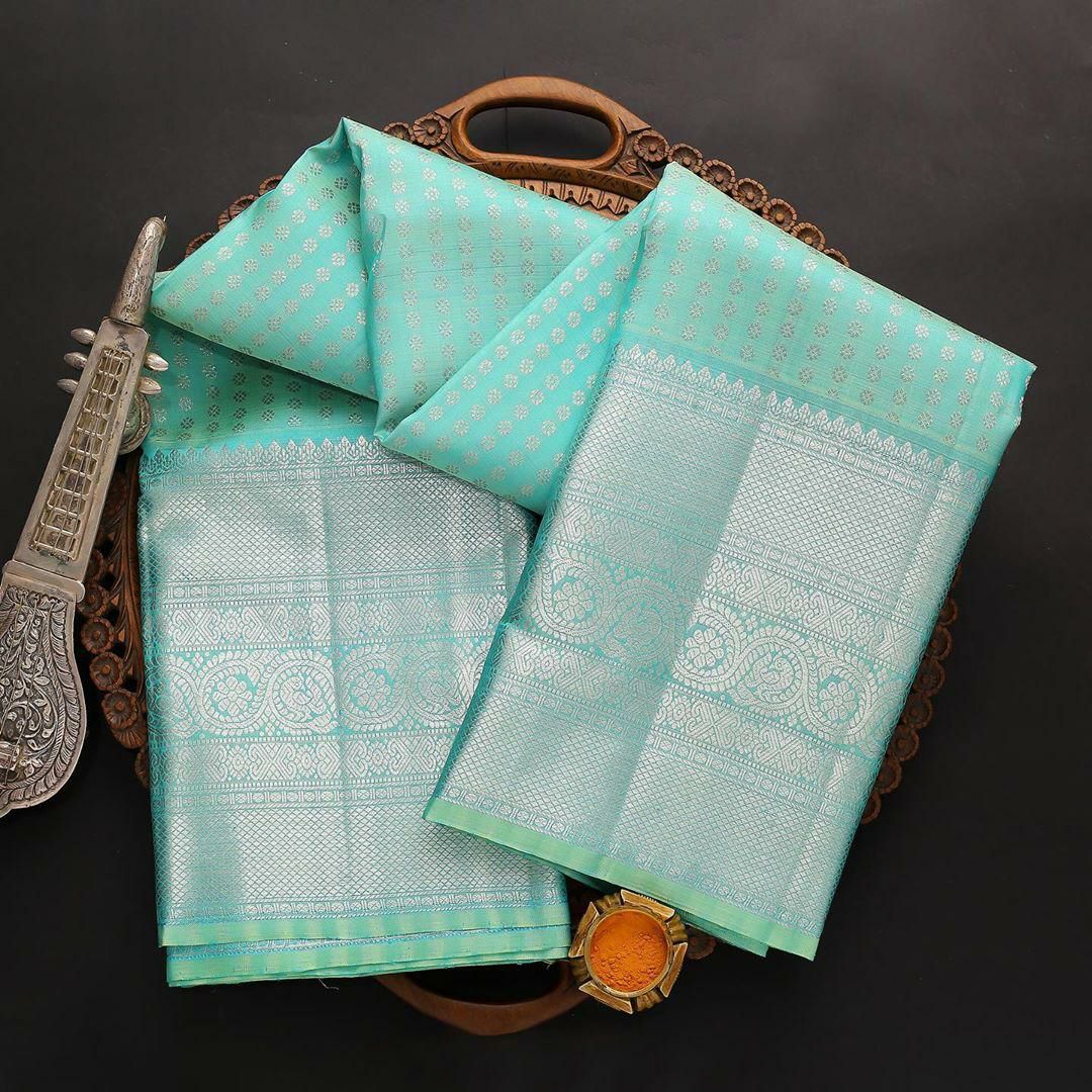 Trandy Firozi Soft Silk Saree With Beautiful Blouse Piece