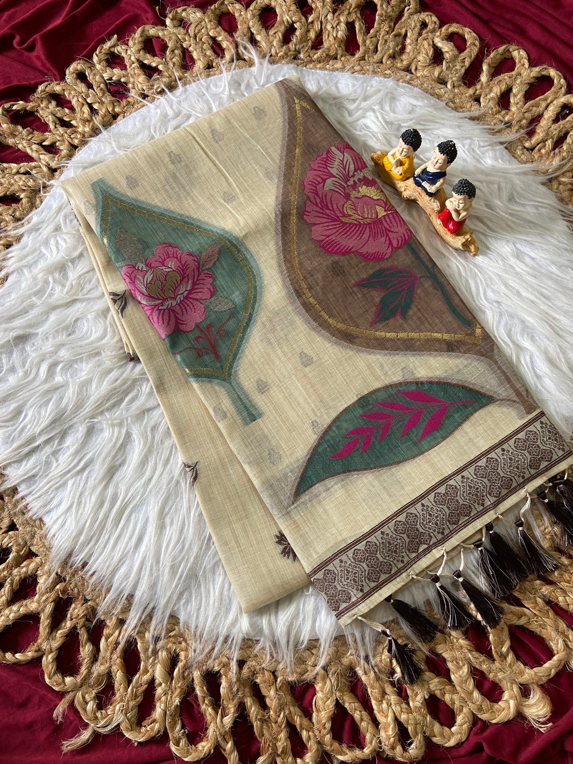 Aavya Ivory Soft Muga Cotton Saree with Artistic Floral Weaving