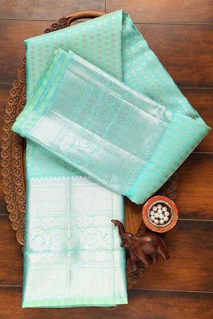 Trandy Firozi Soft Silk Saree With Beautiful Blouse Piece