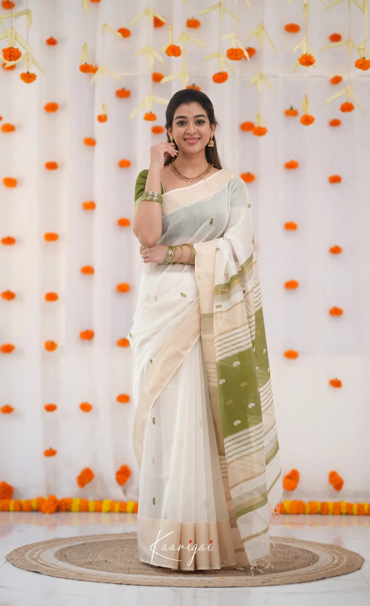 Elegant White Cotton Saree with Olive Green Border – Minimal Festive Look