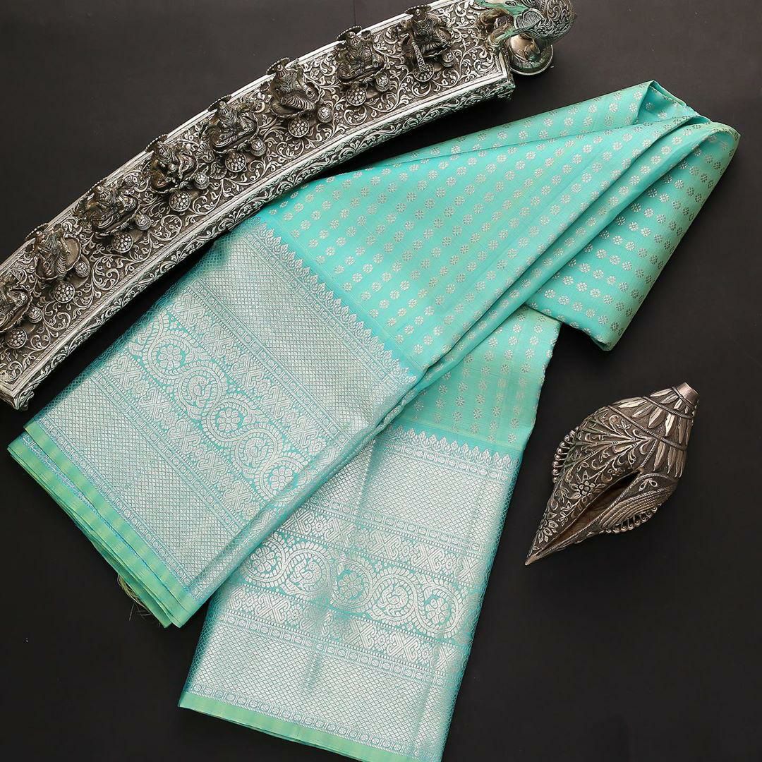 Trandy Firozi Soft Silk Saree With Beautiful Blouse Piece