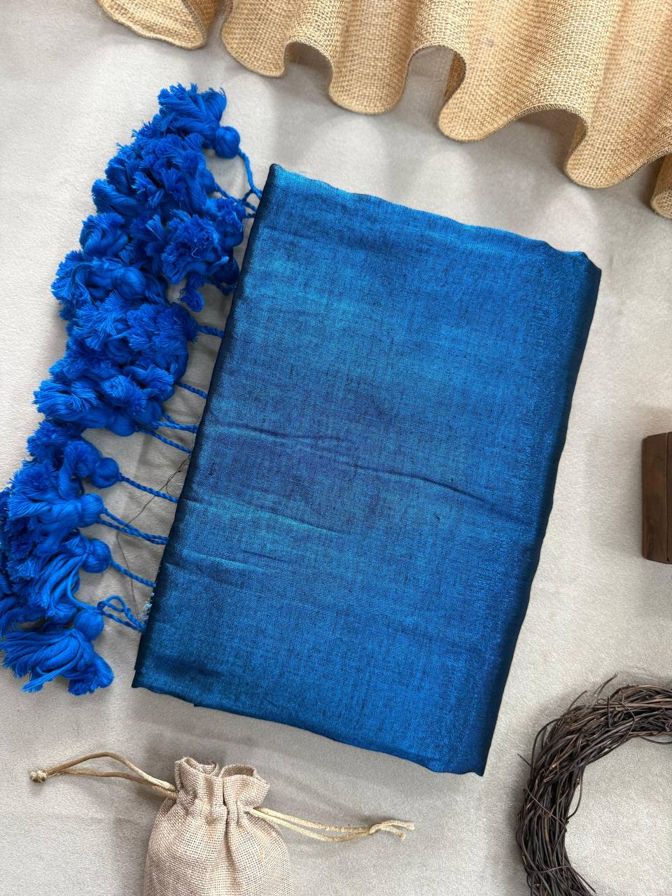 Sky Blue Dual Tone Handloom Raga Tissue Saree With Blue Tassels