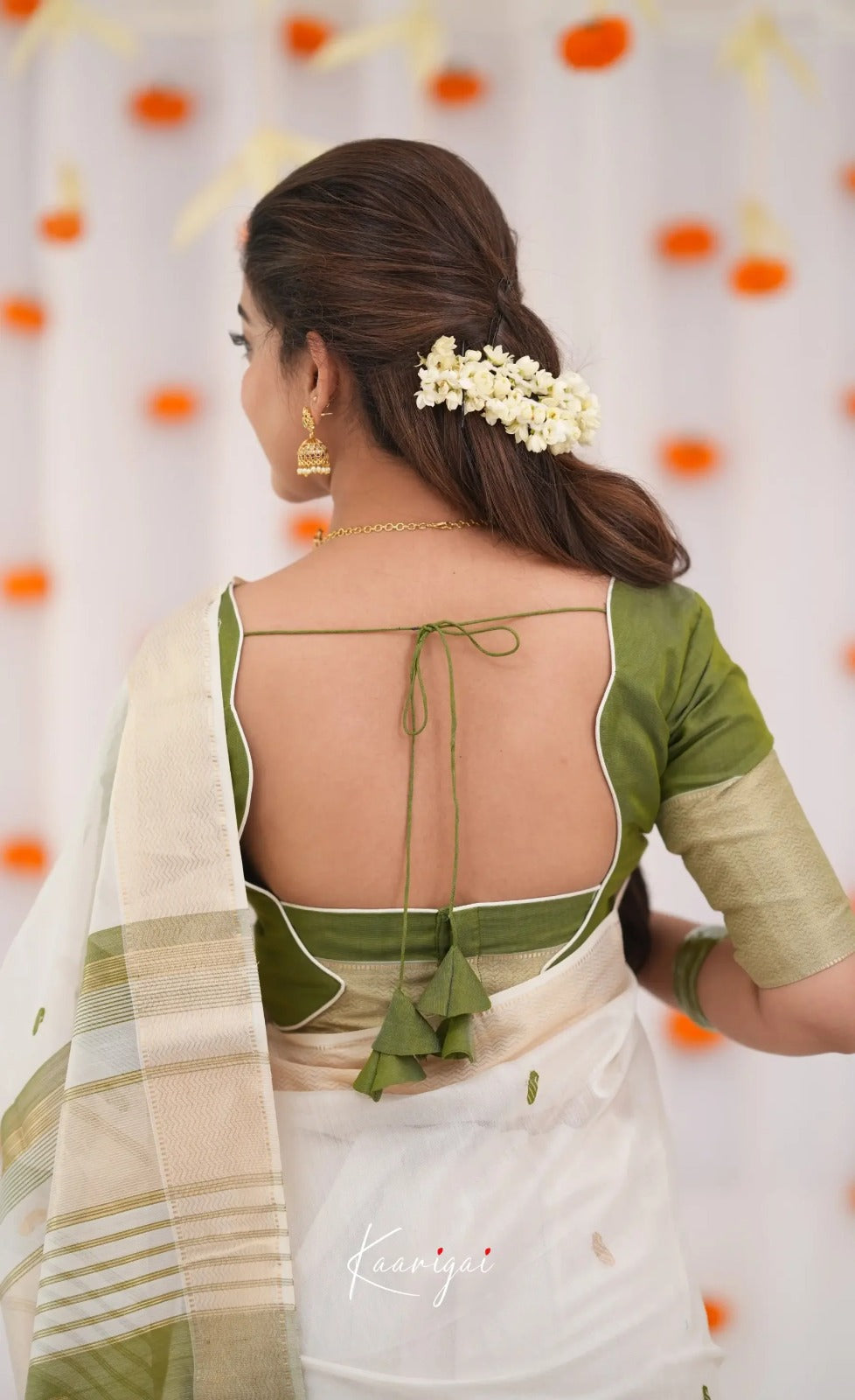 Elegant White Cotton Saree with Olive Green Border – Minimal Festive Look