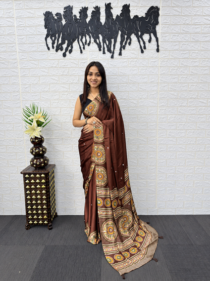 Glamorous Japan Satin Silk Ethnic Saree with Heavy Mirror Work & Elegant Latkans