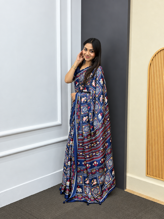 Outstanding Miraaya Navy Blue Japan Satin Silk Patola Saree With Heavy Latkan Pallu Border