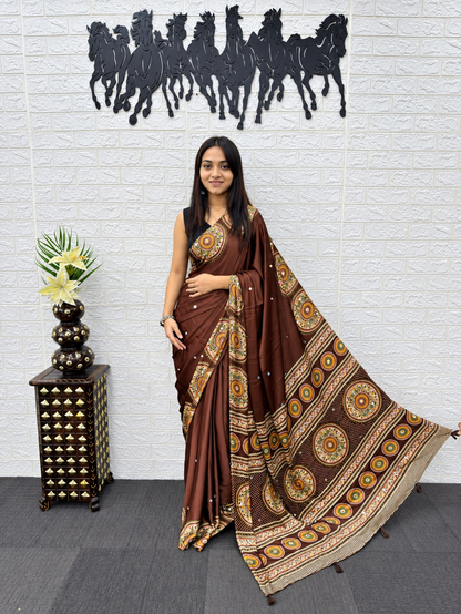 Glamorous Japan Satin Silk Ethnic Saree with Heavy Mirror Work & Elegant Latkans