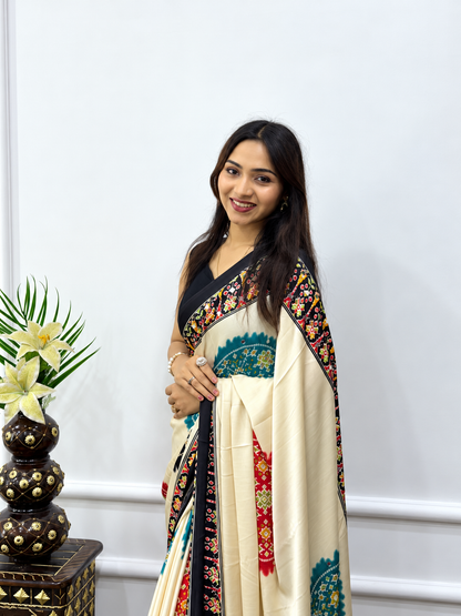 Designer Cream Japan Satin Silk Print Saree with Heavy Mirror Embellished Border and Viscose Latkan Pallu