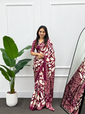 Rich Wine & Cream Fluid Japan Satin Saree Finished with an Haute Couture Heavy Latkan Designer Pallu