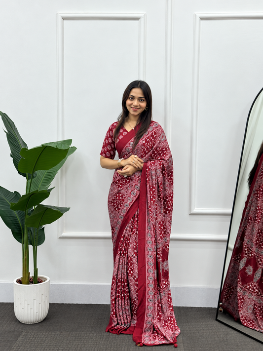 The Kiara  Deep Saffron Maroon Premium Crepe Silk Saree In All Over Classic Print With Matching Blouse Piece