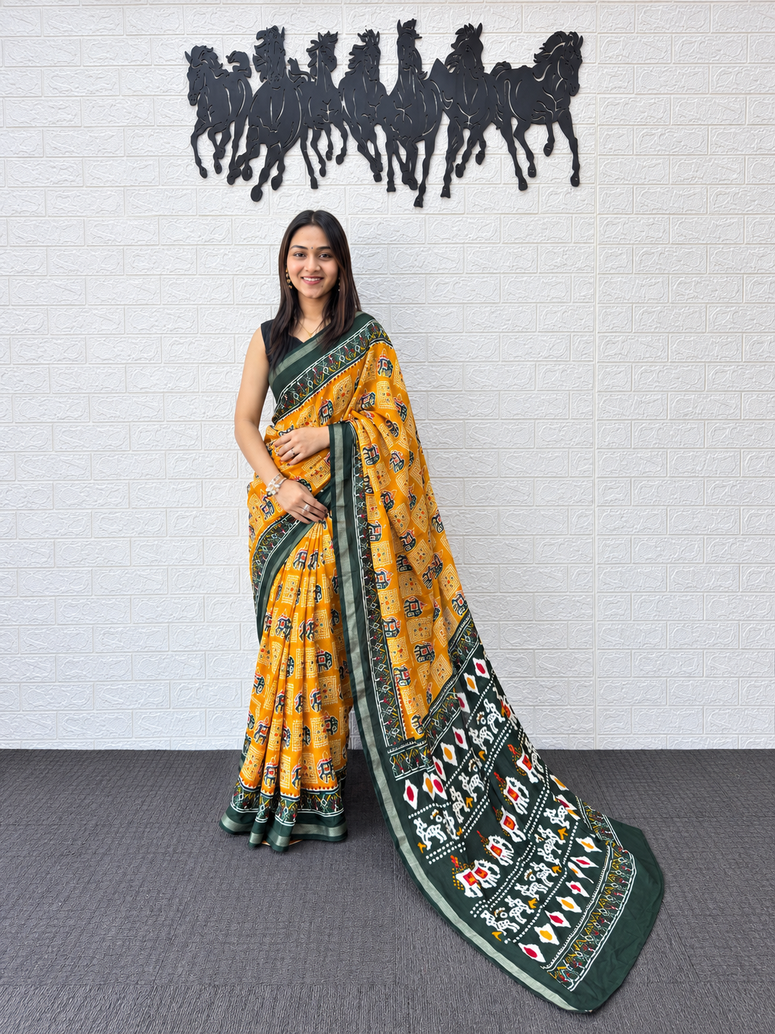 Vibrant Yellow Patola Print Saree in Heavy Mall Cotton with Deep Green Traditional Border
