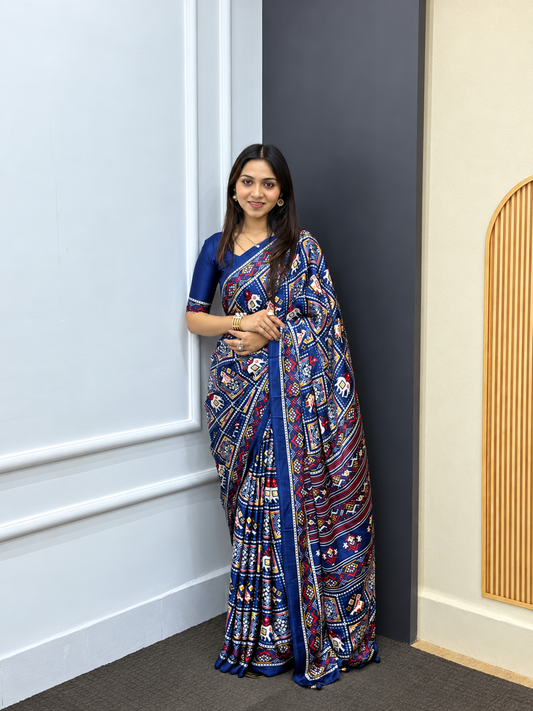 Outstanding Miraaya Navy Blue Japan Satin Silk Patola Saree With Heavy Latkan Pallu Border