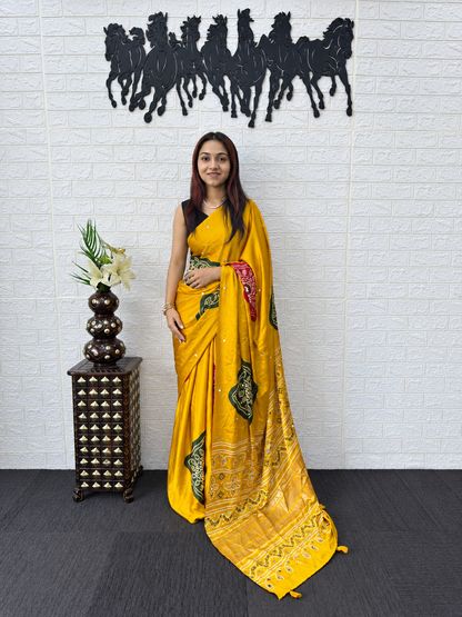 Mustard Glow Japan Satin Silk Saree with Ethnic Bandhani Foil Print and Mirror Work Pallu
