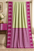 Traditional Kanjivaram Silk Saree in Lime Green with Contrast Pink Zari Border