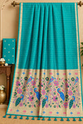 The Peacock’s Oasis Teal Blue Premium Cotton Paithani Saree