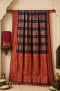 The Deep Dravidian Midnight and Kunkumam Crimson Korvai Silk Saree