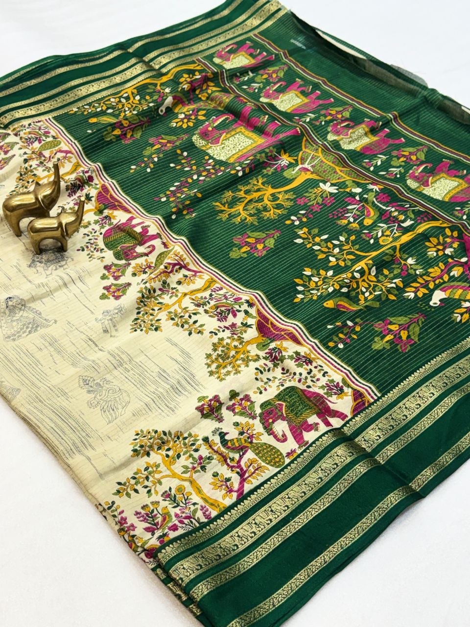 Royal Cream and Emerald Green Saree with Colourful Elephant Motifs and Ornamental Gold Border